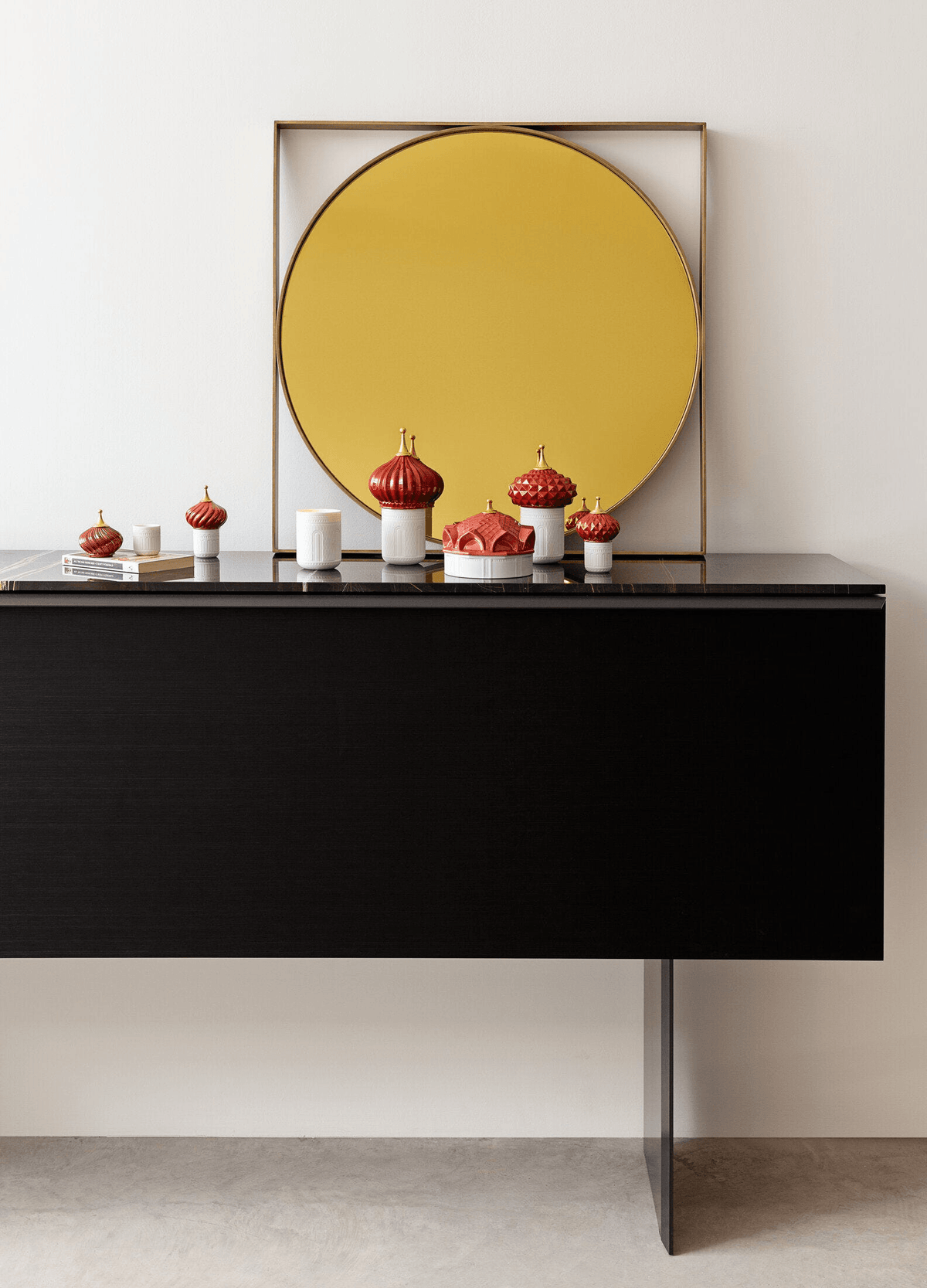 Lladró - Scheherazade's Quarters Candle 1001 Lights (peony) - Night Approaches Scent displayed on a modern black console.