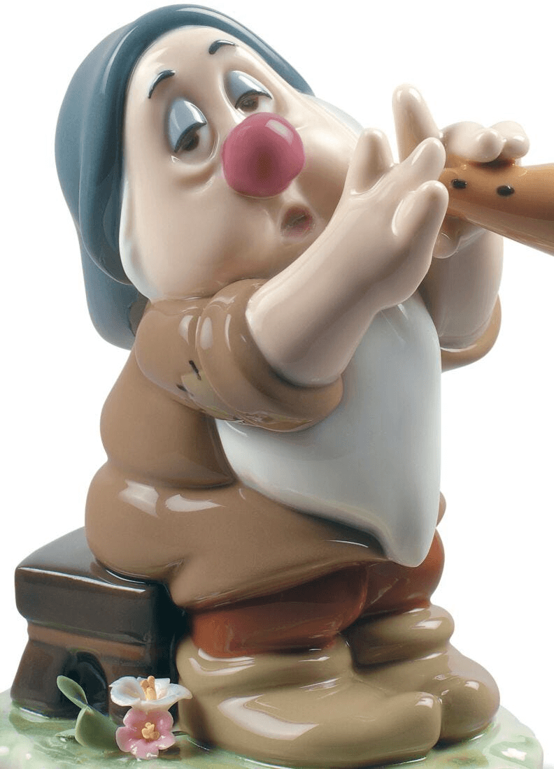 Lladró - Sleepy Snow White Dwarf Figurine made of porcelain, depicting the dwarf playing a flute.