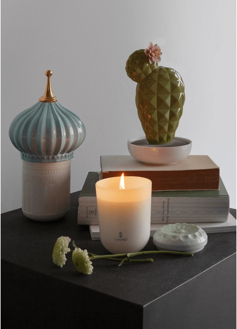 Lladró - Opuntia Cactus Diffuser - Gardens of Valencia Scent with porcelain candle and decorative accents on table.