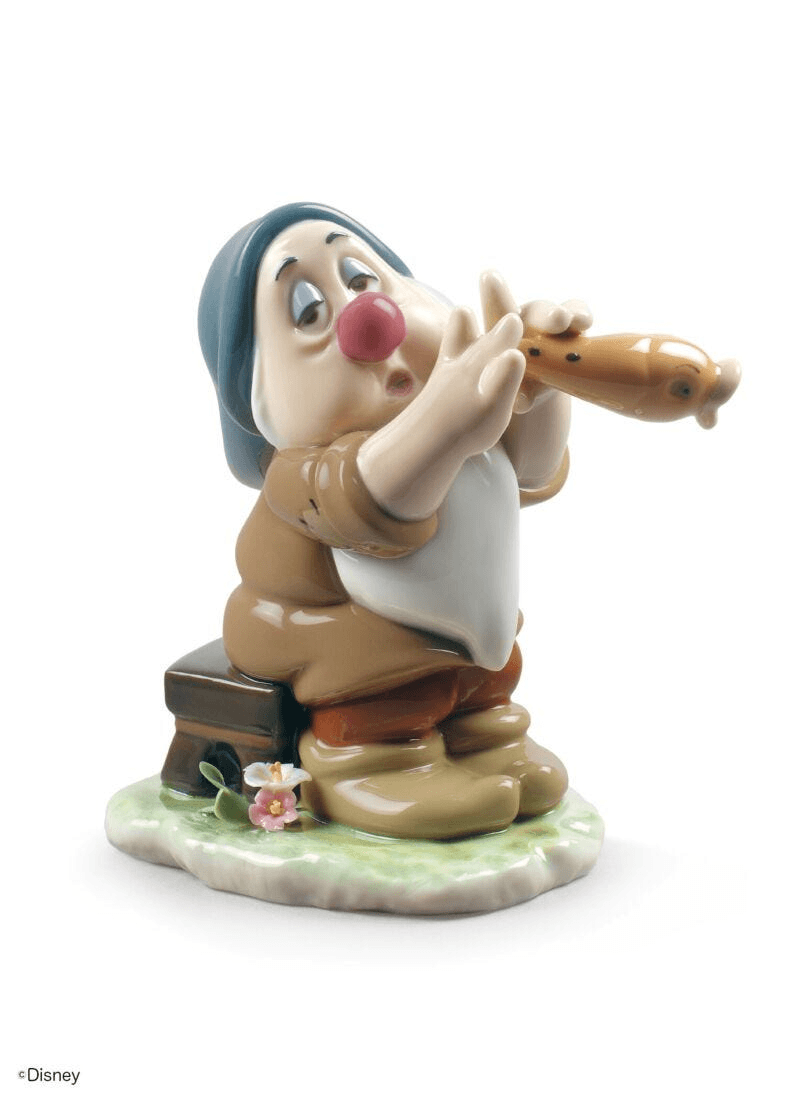 Lladró - Sleepy Snow White Dwarf Figurine playing a flute, crafted in fine porcelain.