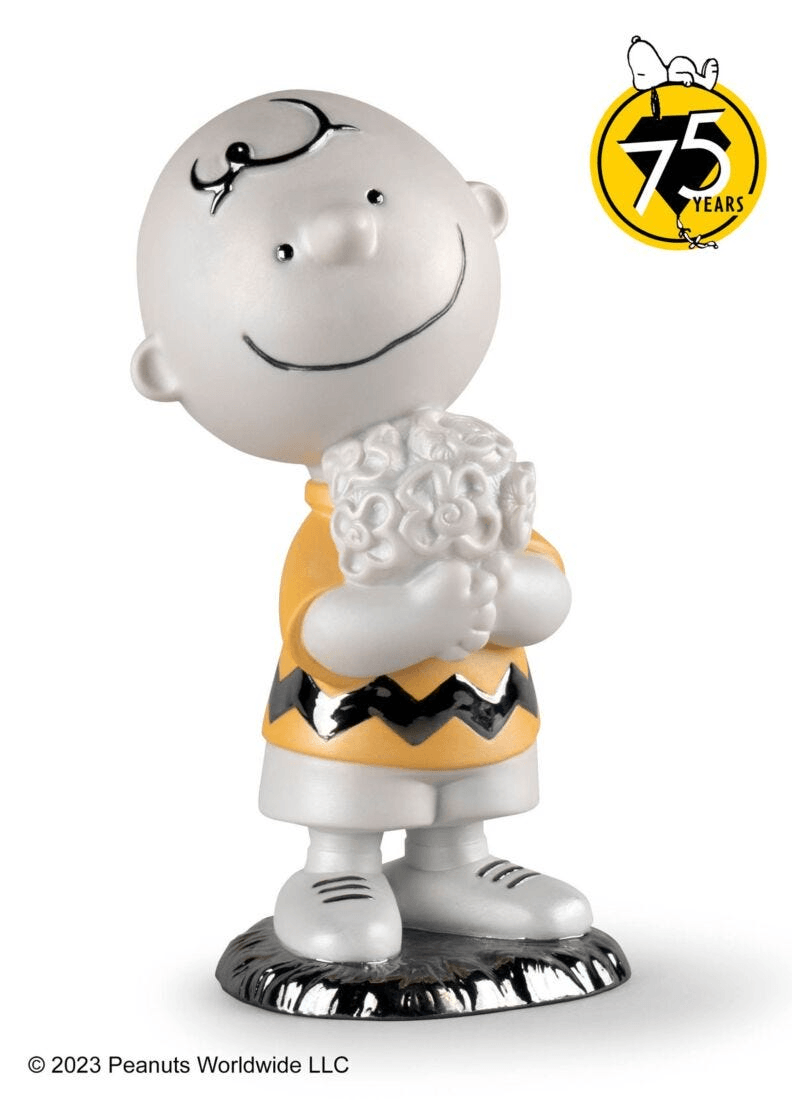 Lladró - Charlie Brown™ Figurine made of porcelain, celebrating 75 years of Peanuts with a special design.