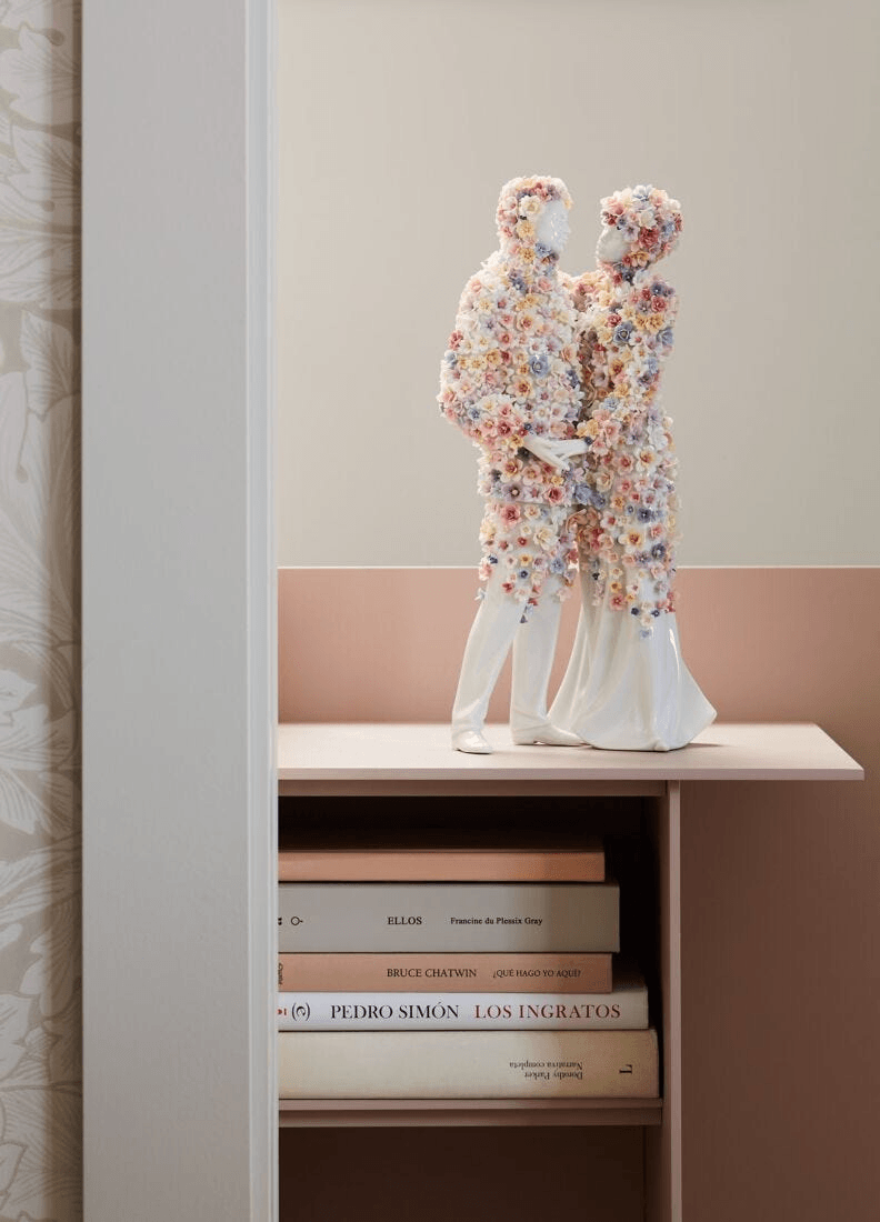 Lladró - Love III (blossoms) Sculpture in porcelain with floral design on display.