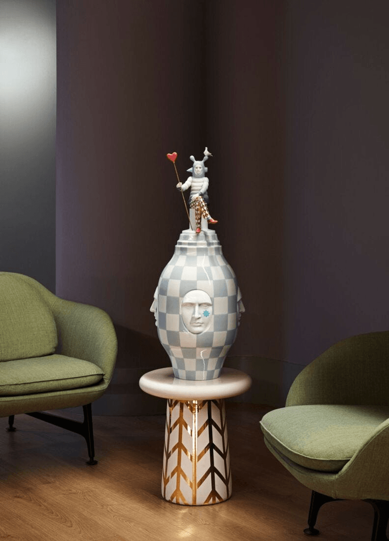 Lladró - The Lover II Sculpture, a porcelain artwork by Jaime Hayon, showcasing a playful lover figure.