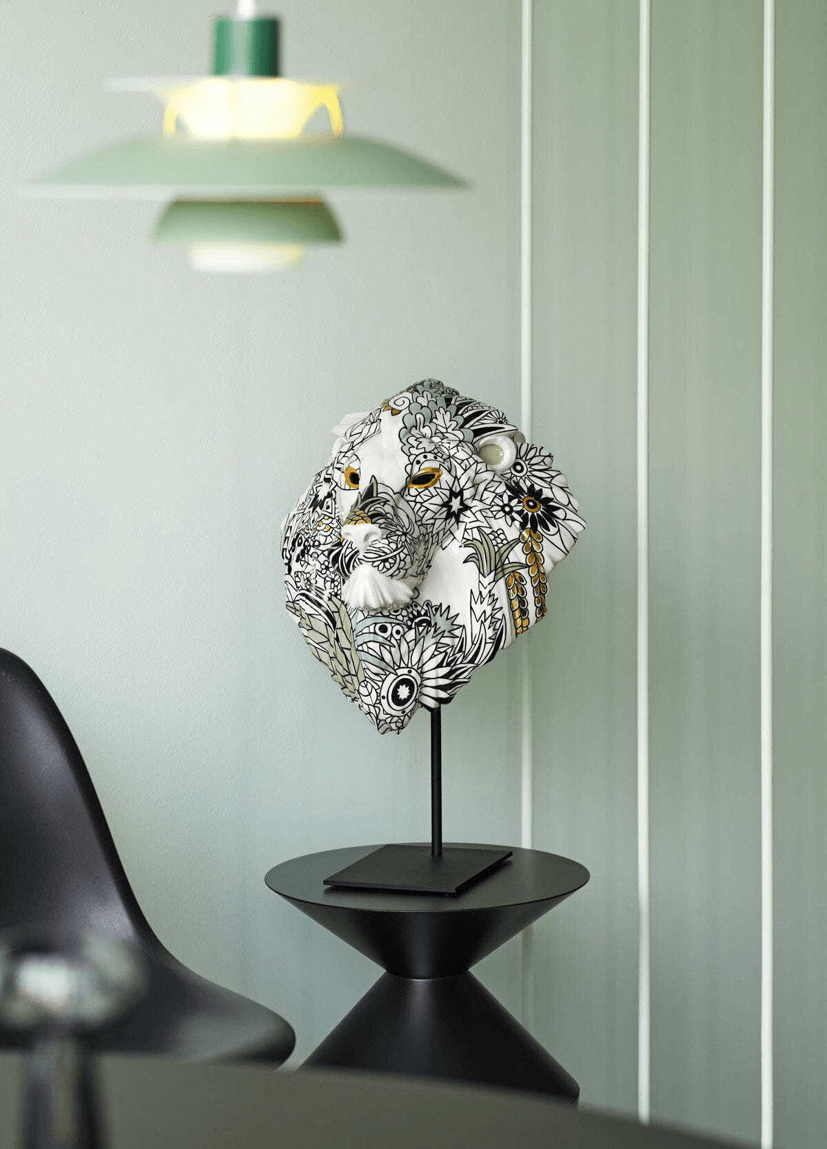 Lladró - Lion Mask - Wild Nature displayed artfully on a stand, featuring intricate floral design on porcelain.