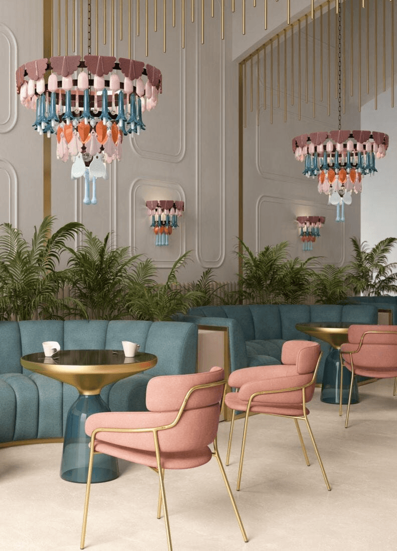 Lladró - Seasons Chandelier 70 - Fall displayed in a stylish café setting with elegant seating.