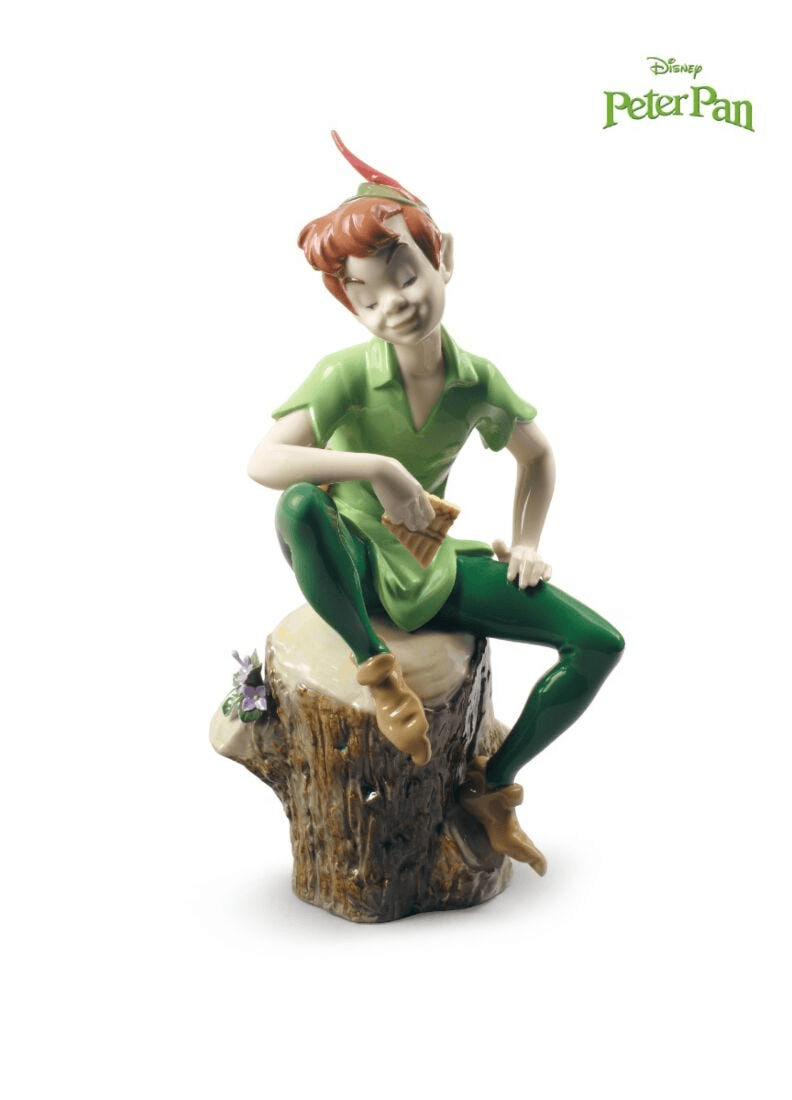 Lladró - Peter Pan Figure made of porcelain, beautifully detailed in signature colors, sitting on a tree stump.