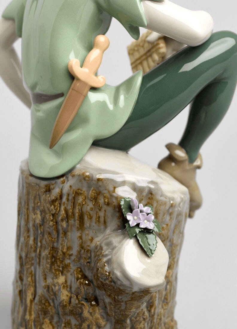 Lladró - Peter Pan Figure made of porcelain, highlighting detailing and craftsmanship in a playful, collectible pose.