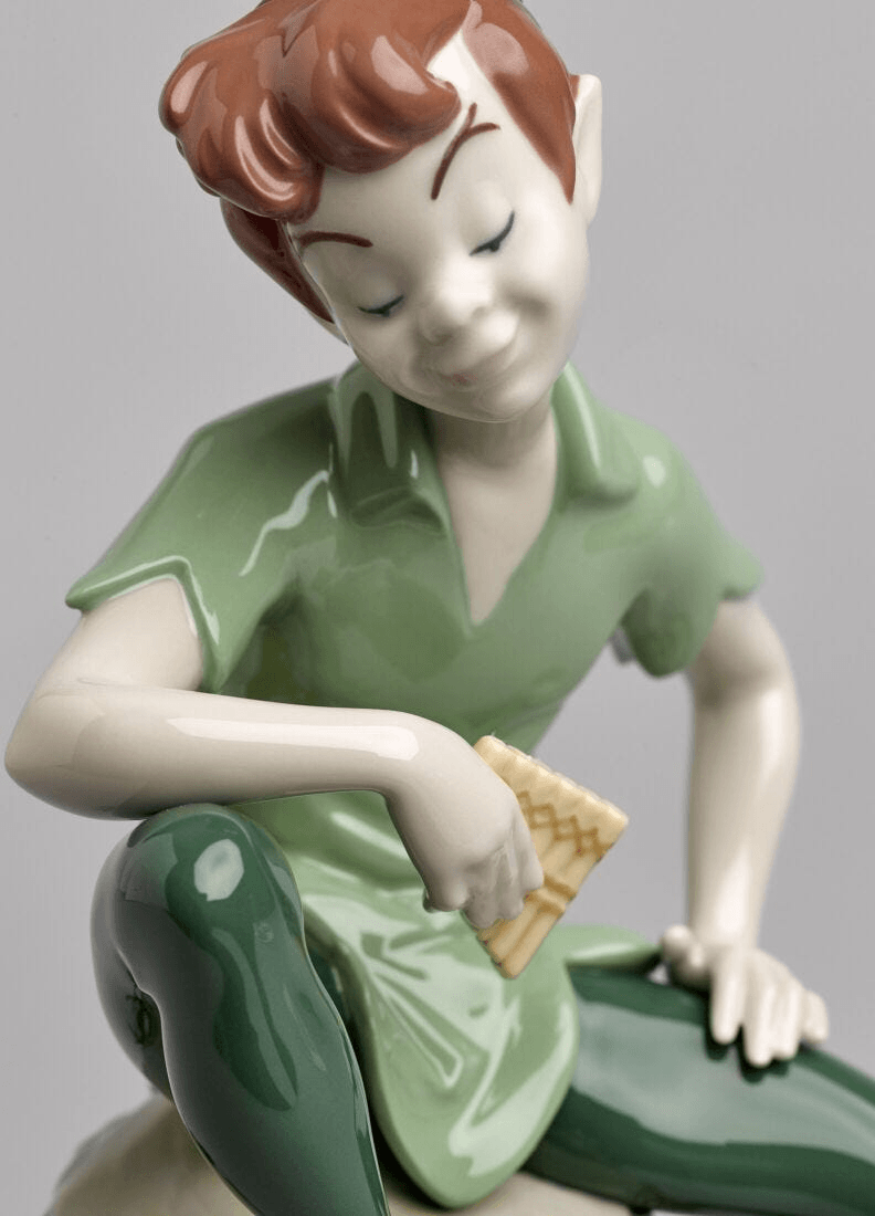Lladró - Peter Pan Figure made of porcelain, depicting Peter in a playful pose with vibrant colors.
