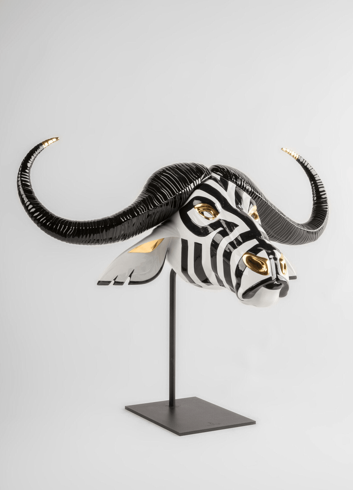 Lladró - Buffalo Mask - Black and Gold in porcelain with black and gold accents, part of the Fierce Portraits collection.