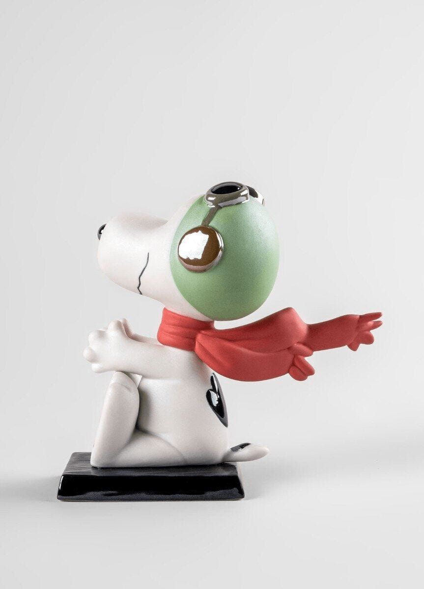 Lladró - Snoopy™ Flying Ace Figurine in porcelain with green pilot helmet and red scarf