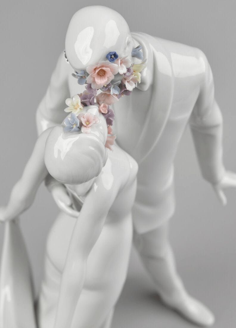 Lladró - Love I (Blossoms) - Sculpture showcasing a couple adorned with delicate porcelain flowers.