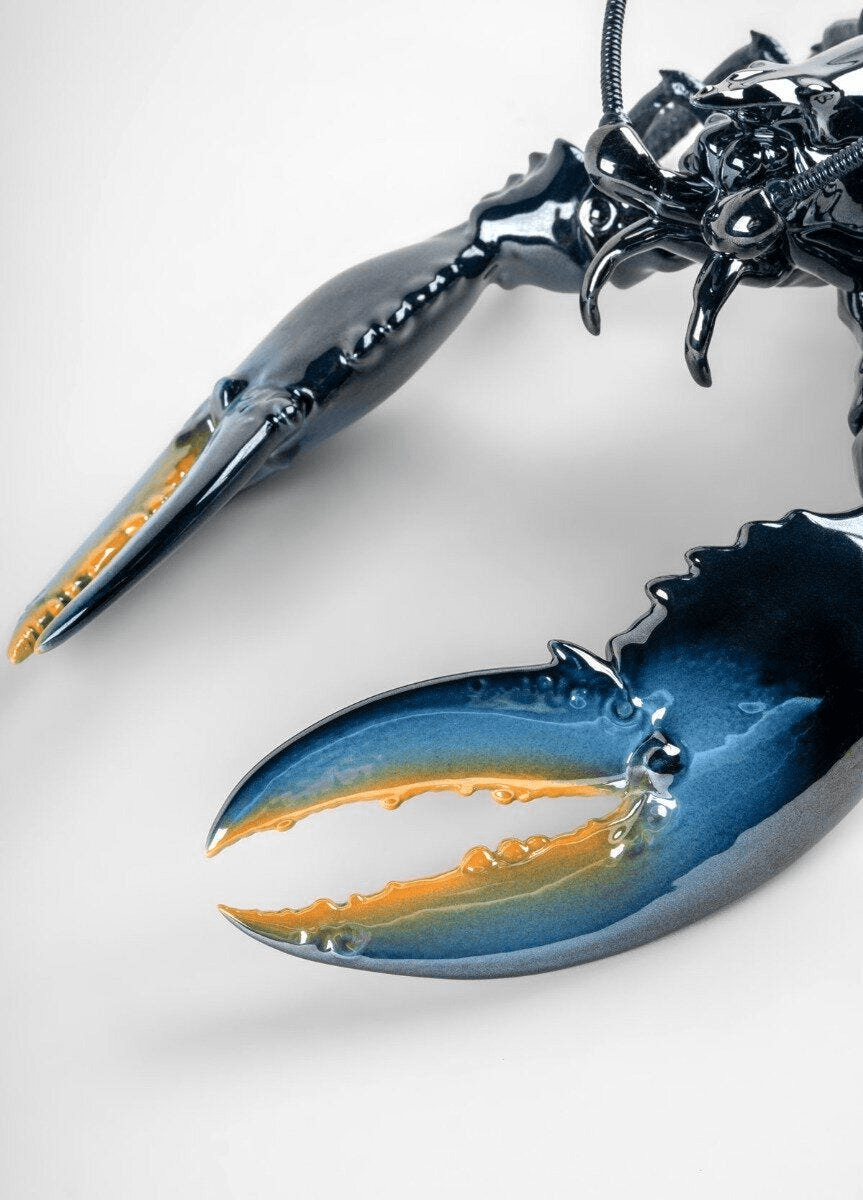 Lladró - Lobster Sculpture - Blue featuring intricate porcelain details and claws, perfect for sea lovers.