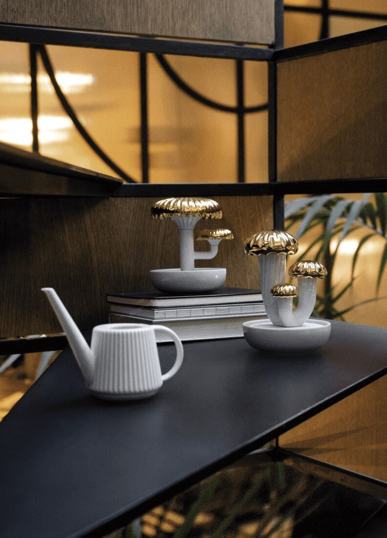 Lladró - Boletus 2 Diffuser - Gold - Night approaches Scent on a stylish shelf with white porcelain and golden accents.