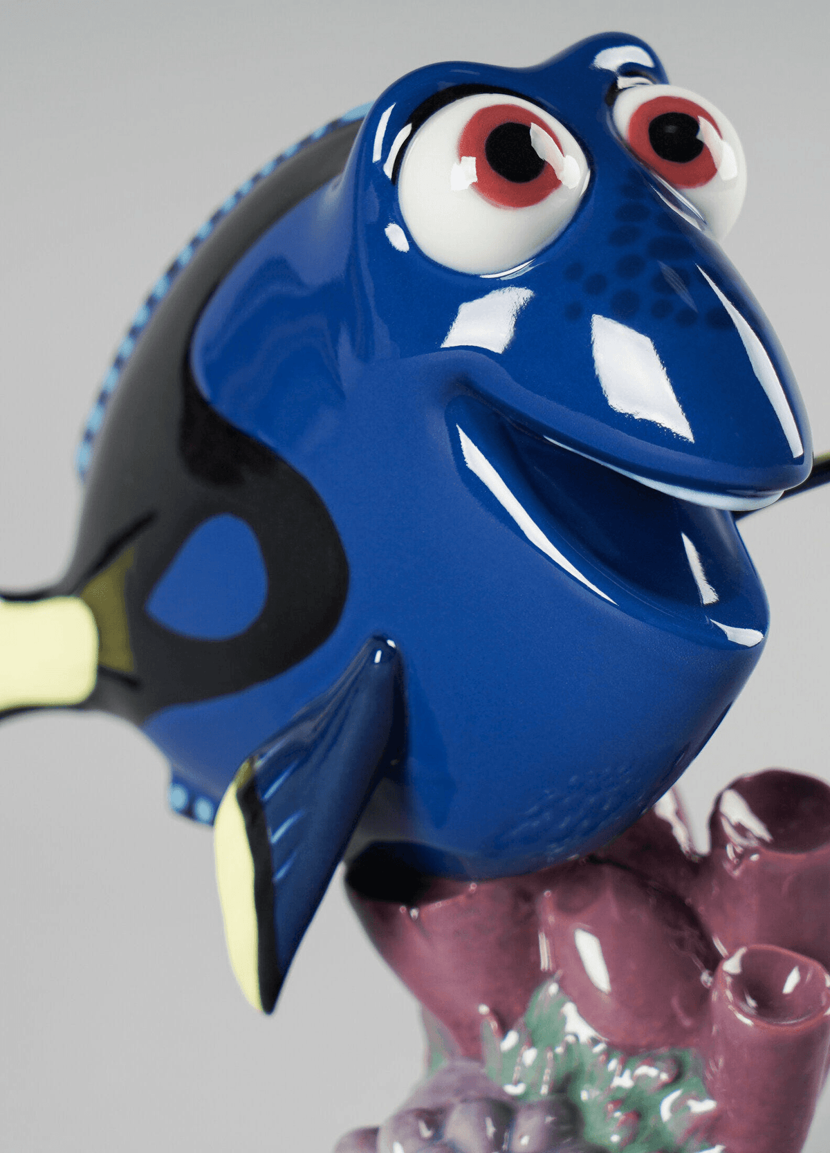 Lladró - Dory Figurine, handcrafted glazed porcelain, blue color, character from Finding Dory, front view.