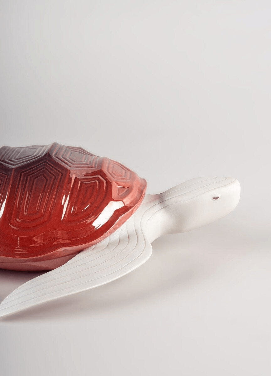 Lladró - Turtle Sculpture in porcelain showcasing geometric patterns and intense red decoration.