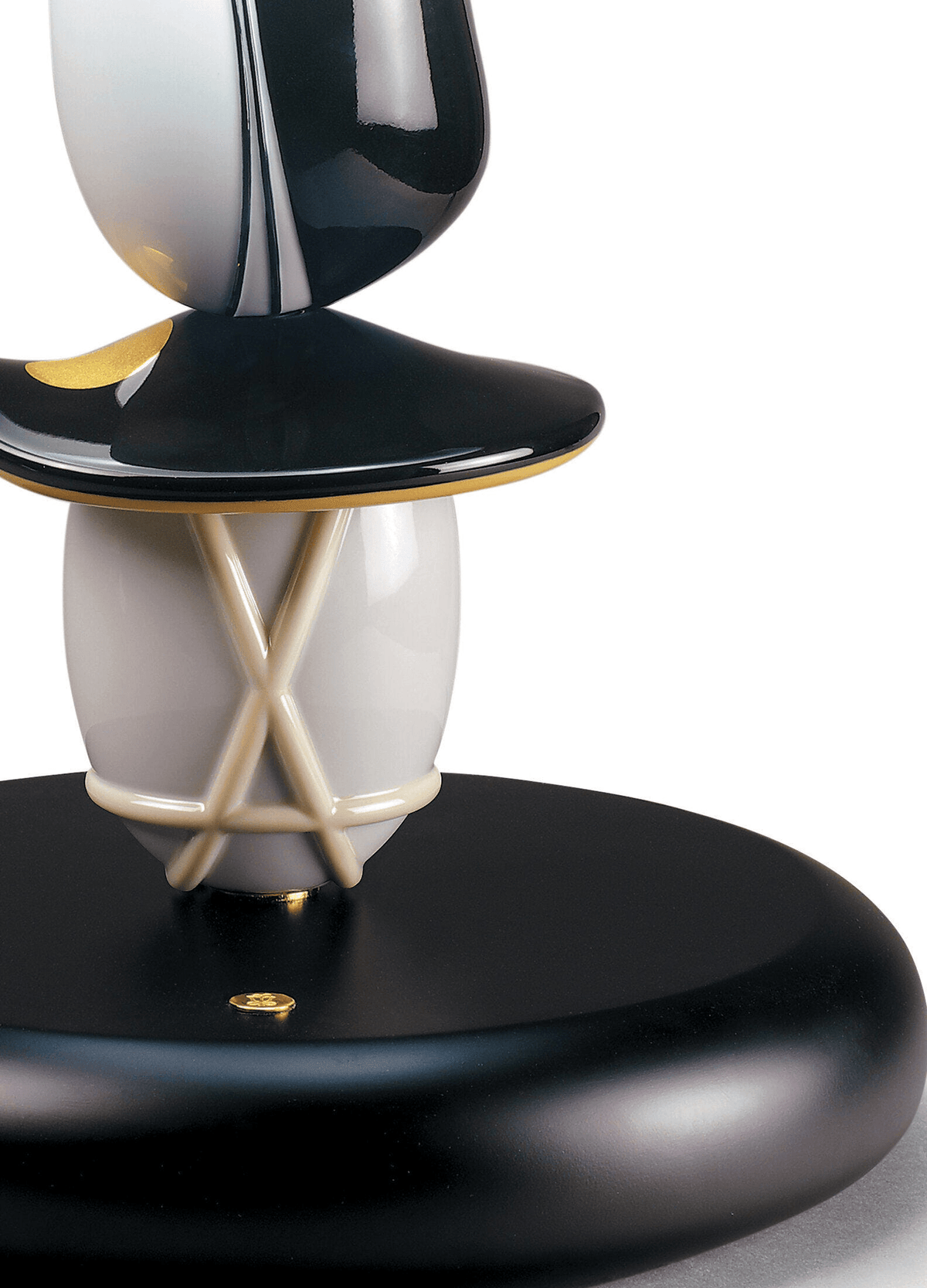Lladró - Hairstyle (H/M) Table Lamp close-up showing elegant black and white porcelain design with golden accents.