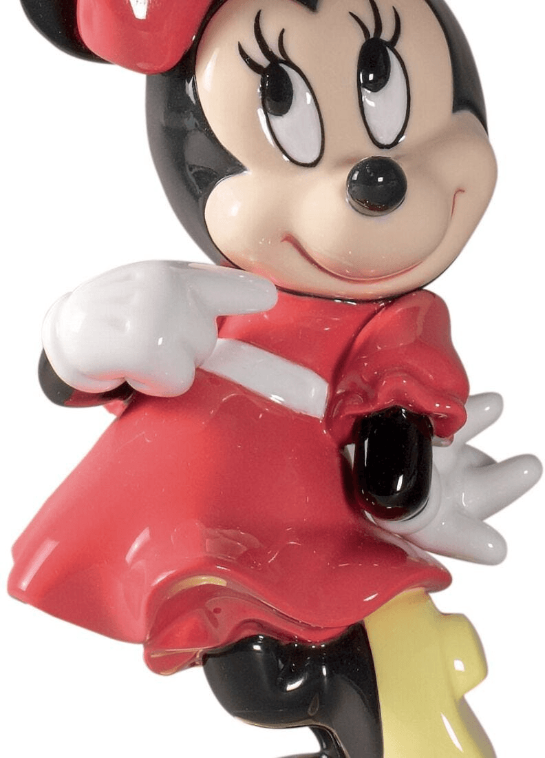 Lladró - Minnie Mouse Figurine in detailed porcelain finish showcasing her iconic red dress and playful pose.