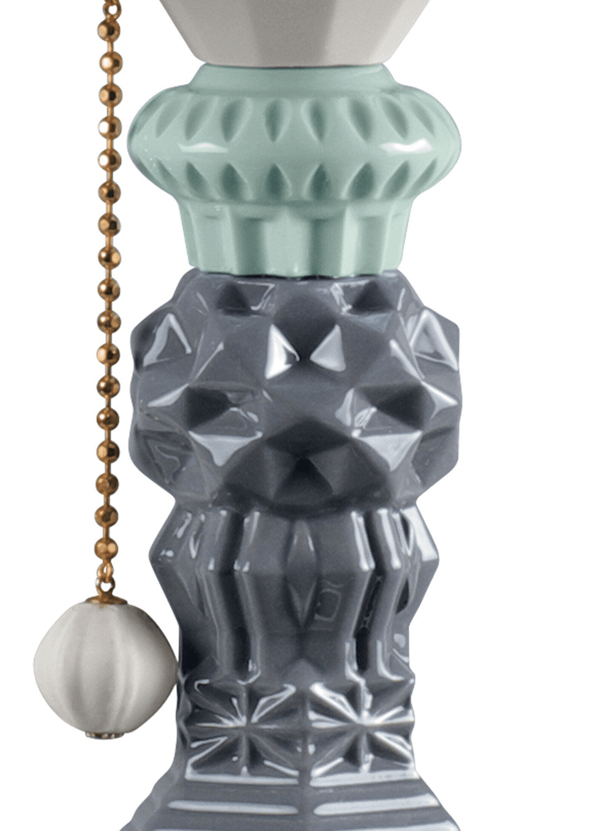 Porcelain Lladro geometric grey base detail of the Lladró - Belle de Nuit Table lamp - Black, showing a beaded pull chain.