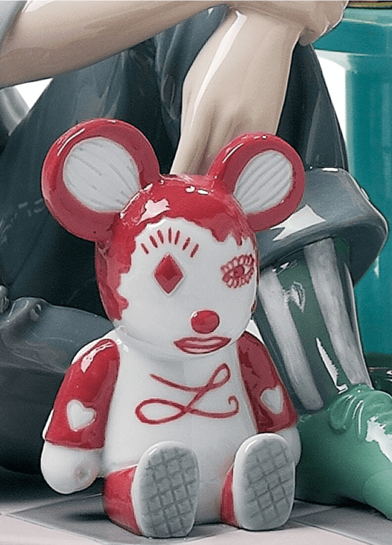 Lladró - The Family Portrait Sculpture featuring a playful porcelain bear figurine.
