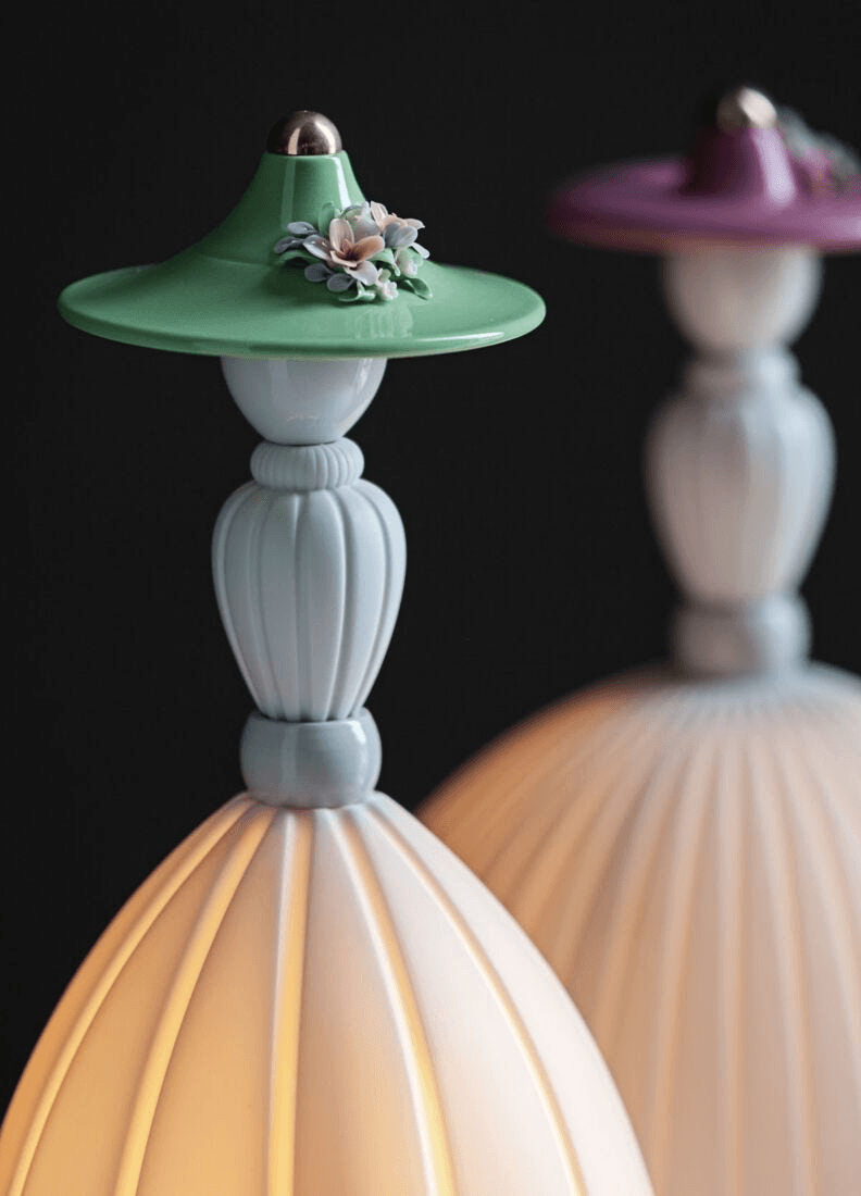 Lladró - Mademoiselle Table Lamp - Elisabeth in Lladro Porcelain, featuring a green hat with floral detail.