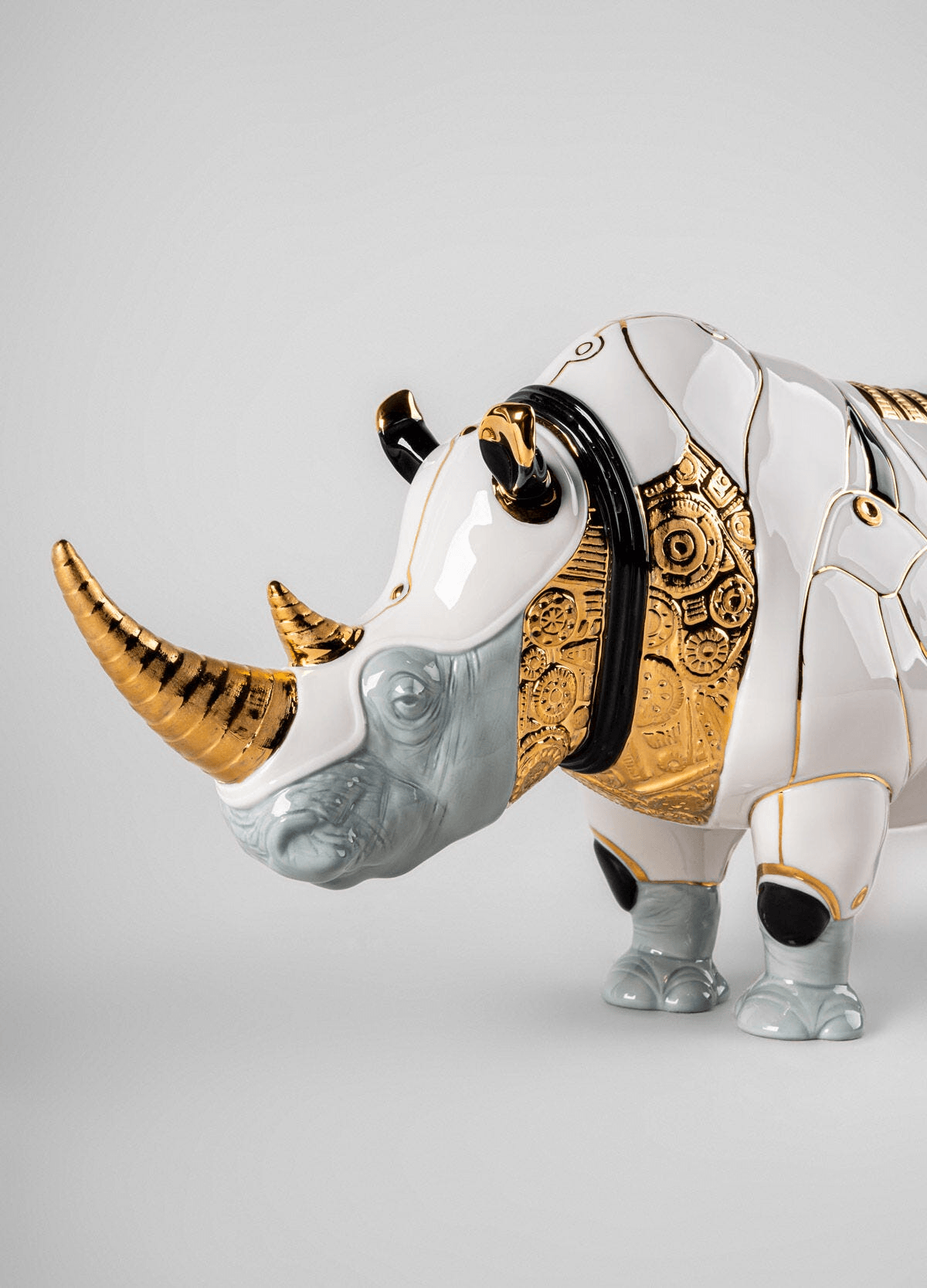 Lladró - Rhino Cyborg Sculpture, a unique porcelain art piece blending animal and machine elements.