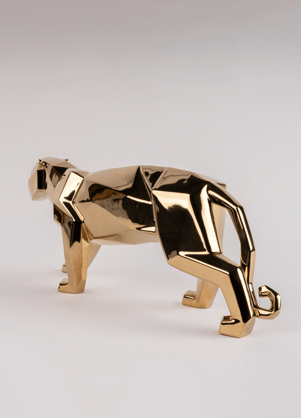 Lladró - Panther Sculpture - Golden with a shiny metallic finish, contemporary porcelain piece inspired by origami.