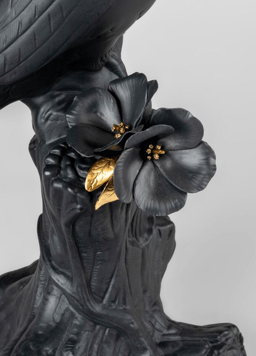 Lladró - Toucan Sculpture - Black-gold - Limited Edition close-up of black flowers with gold details in porcelain