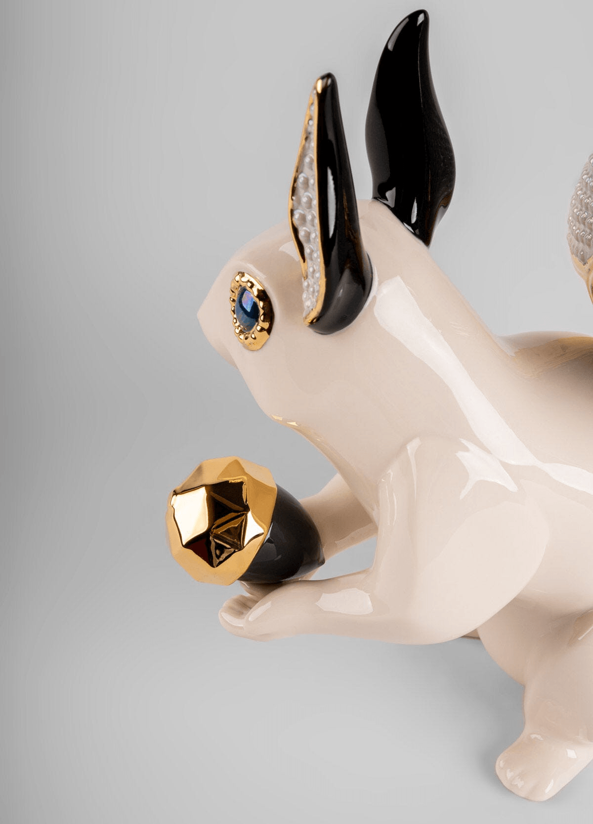 Lladró - Squirrel Jewel Sculpture crafted in porcelain, showcasing intricate detailing and gold accents.