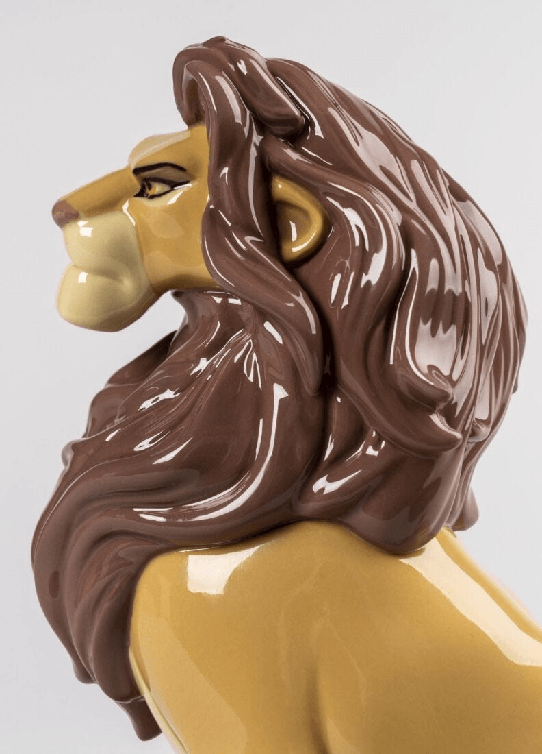 Lladró - Simba Figurine profile view, glazed porcelain depicting a noble lion with vibrant colors.