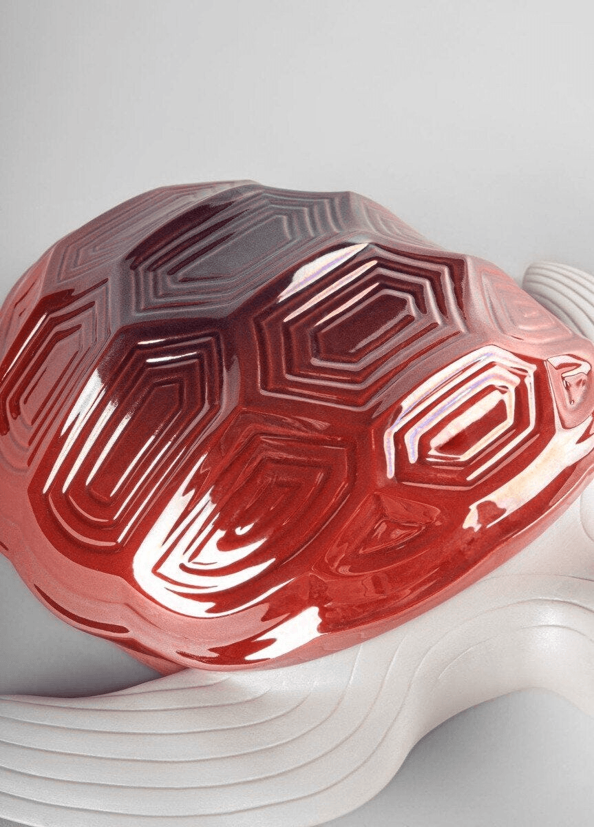 Lladró - Turtle Sculpture featuring a geometric red porcelain design and elegant details.
