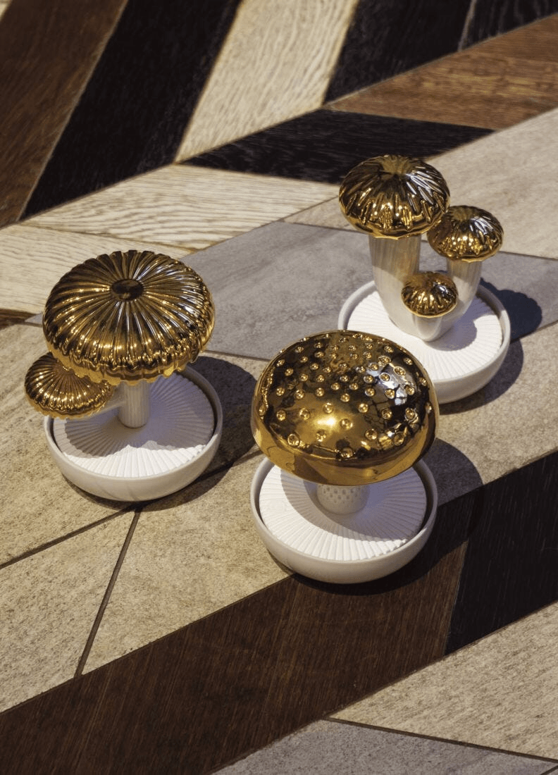 Lladró - Boletus 1 Diffuser - Gold - On the prairie Scent displayed on textured floor.