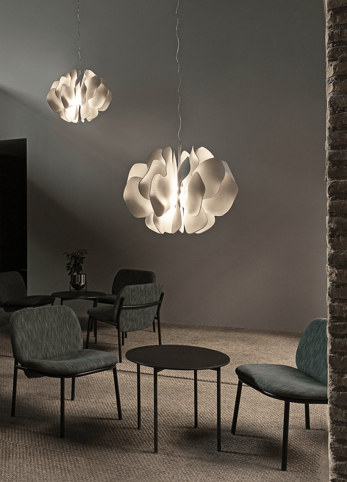 Lladró - Nightbloom Pendant Light - N40 - White illuminating a modern space with elegant design and porcelain finish.