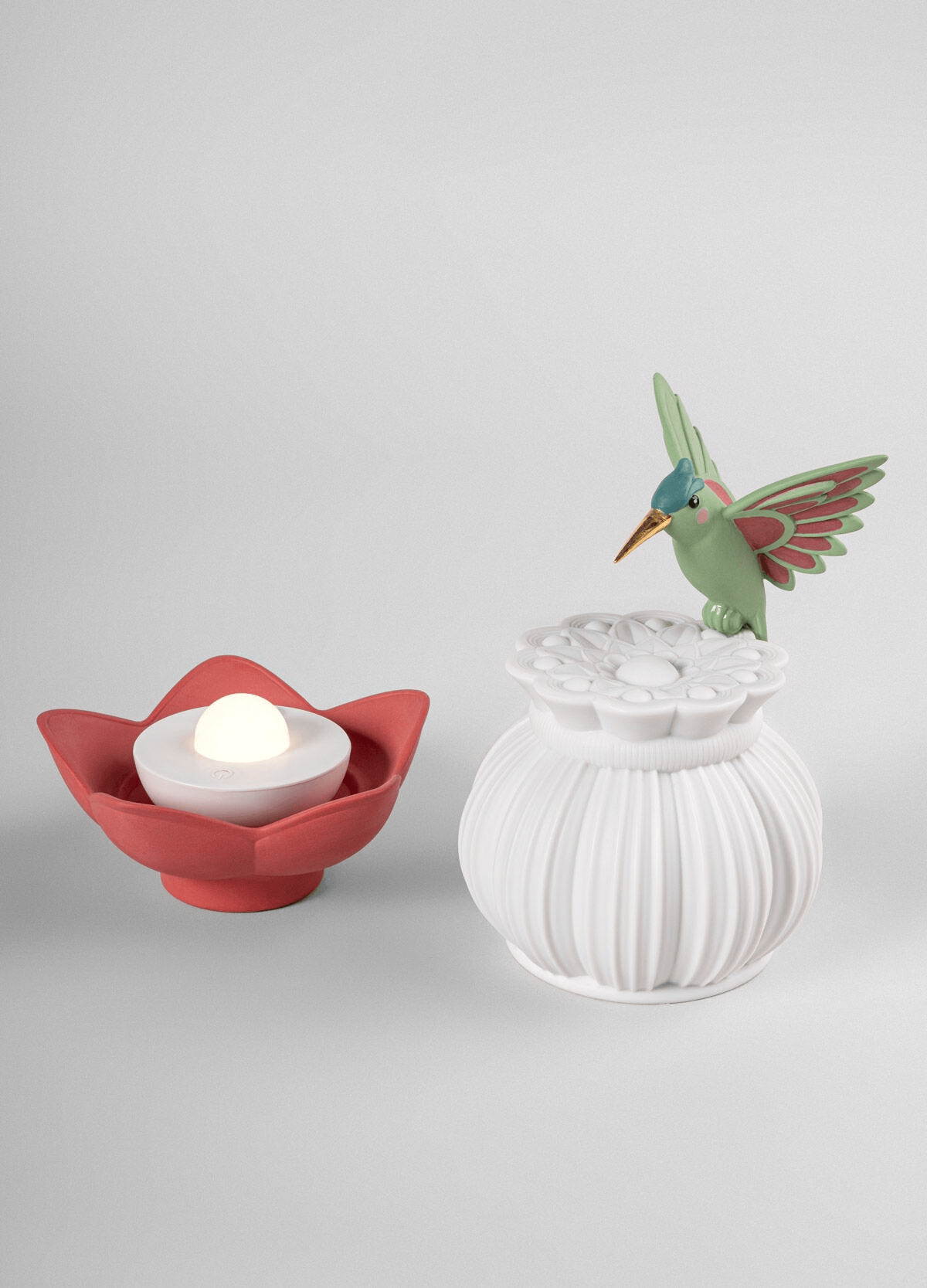 Lladró - Utopical Wireless Table Lamp featuring a hummingbird and flower design, made of porcelain.