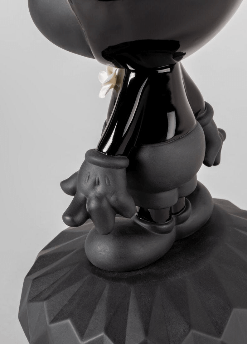 Lladró - Mickey Total Black Sculpture showcasing the sleek porcelain design and iconic Mickey Mouse character in black.