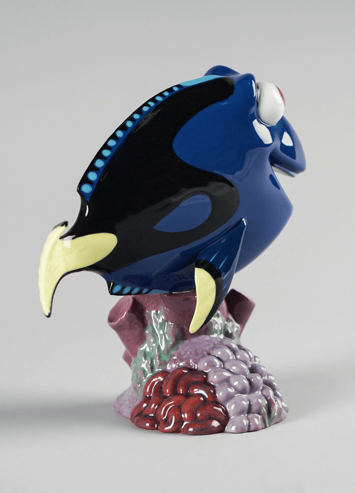 Lladró - Dory Figurine, handcrafted glazed porcelain collectible, featuring Dory from Finding Nemo, vibrant blue finish.