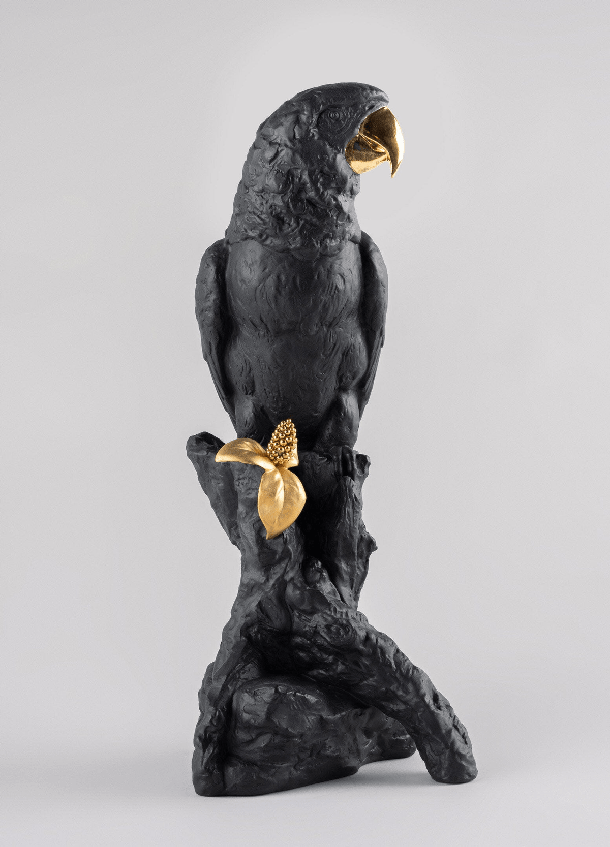 Lladró - Macaw Bird Sculpture - Black-Gold - Limited Edition, elegant porcelain bird design in black and gold.