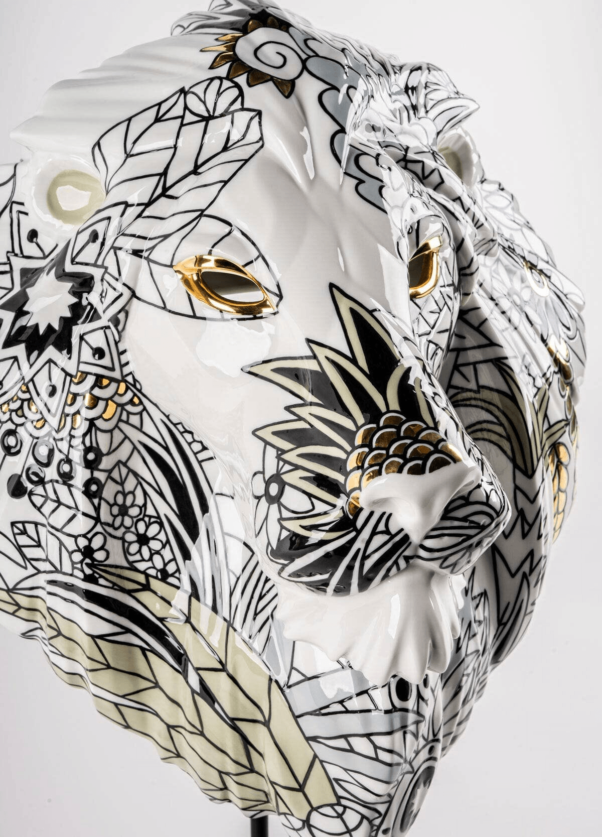 Lladró - Lion Mask - Wild Nature, porcelain lion mask with floral design and contemporary lines.
