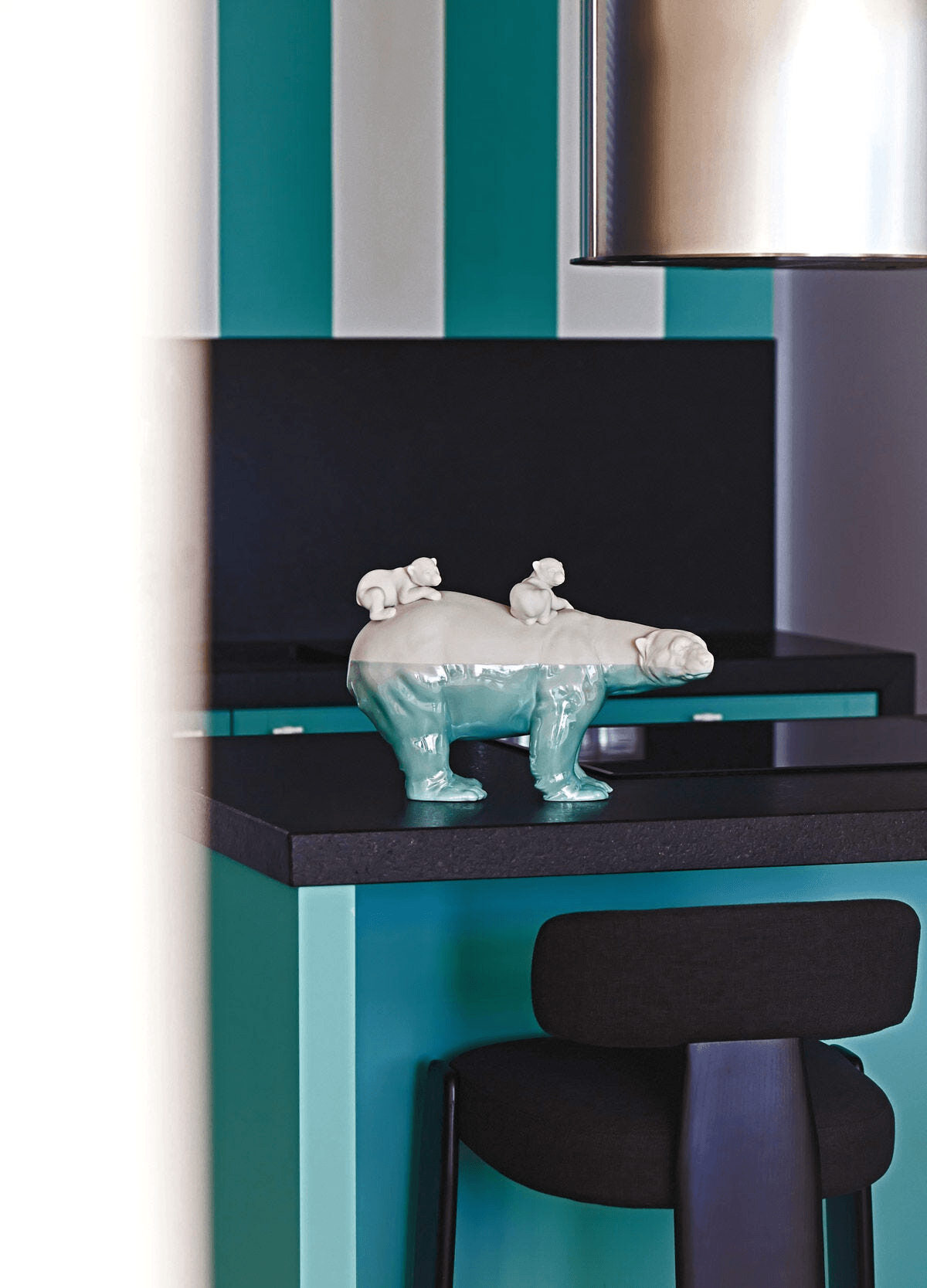 Lladró - Mummy bear and babies - Underwater Sculpture displayed on a kitchen countertop, showcasing porcelain artistry.