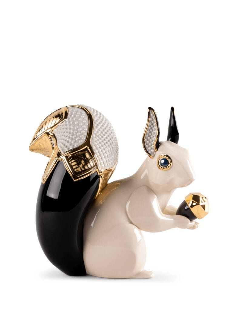 Lladró - Squirrel Jewel Sculpture in porcelain, featuring a detailed squirrel holding a gem.
