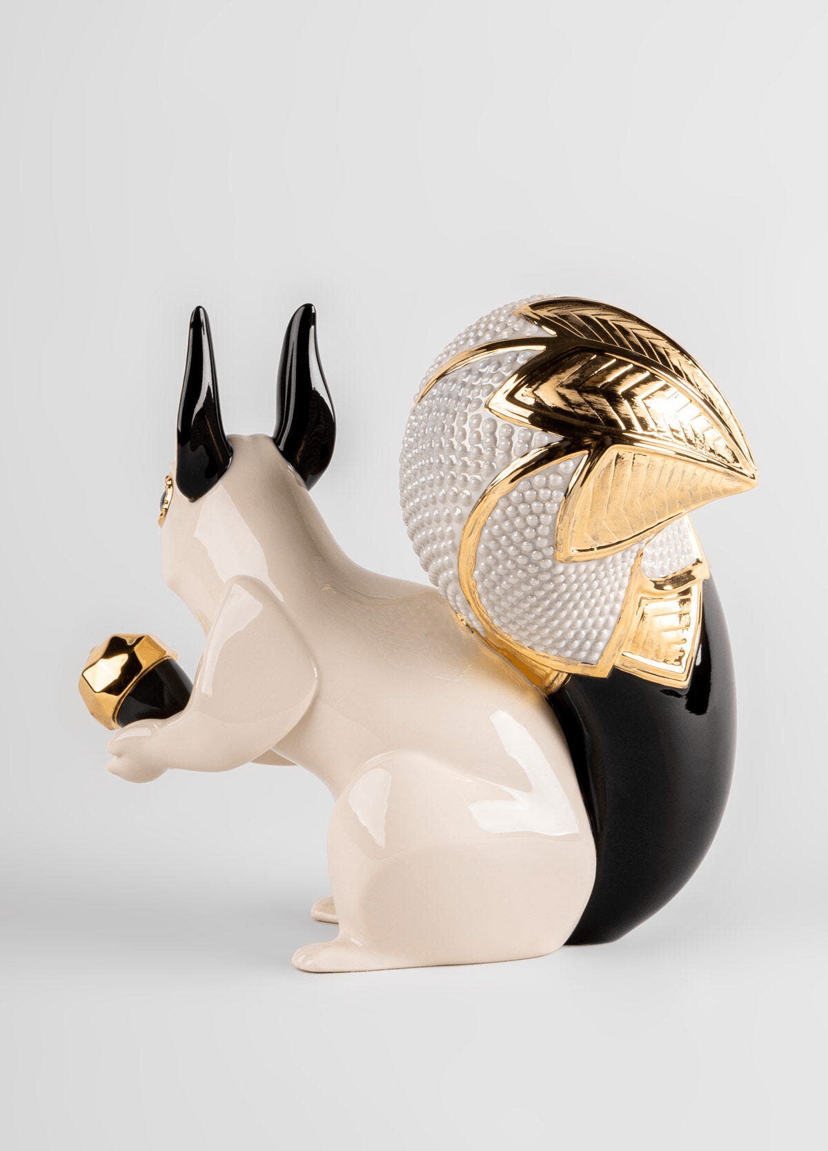 Lladró - Squirrel Jewel Sculpture showcasing porcelain craftsmanship with elegant geometric design.