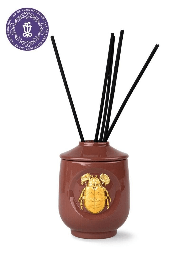 Lladró - Scarab Perfume Diffuser Luxurious Animals - Moonlight Scent in porcelain with golden scarab detail.