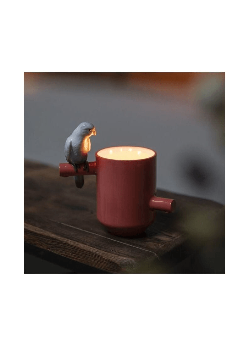 Lladró -Parrot's scented Treasure - On the Prairie Scent - Green vase with parrot figure and candlelight.