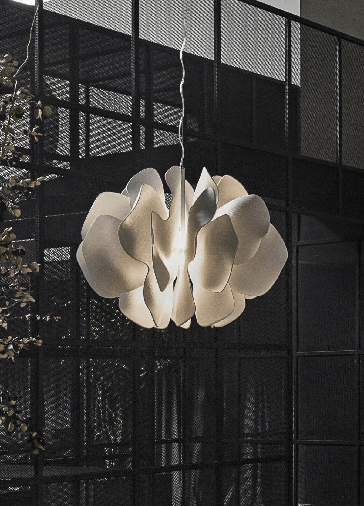 Lladró - Nightbloom Pendant Light - N40 - White illuminating a modern space with organic porcelain design.