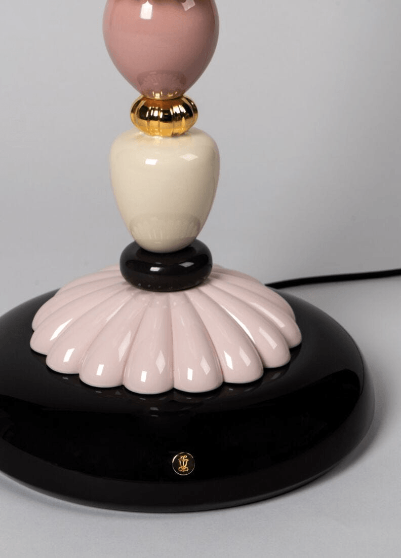 Lladró - Firefly Floor Lamp - Pink and Gold base detail. A stunning piece of glazed Lladro Porcelain with black and gold accents.
