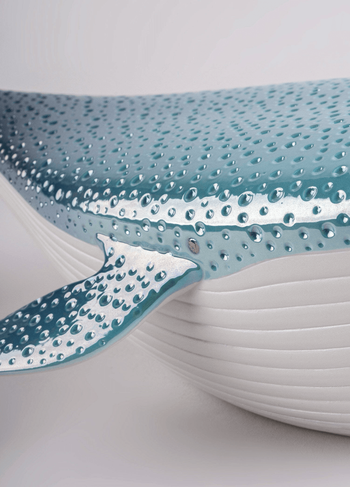Lladró - Whale porcelain decorative piece showcasing beautiful blue and white detailing, perfect gift for nature lovers.