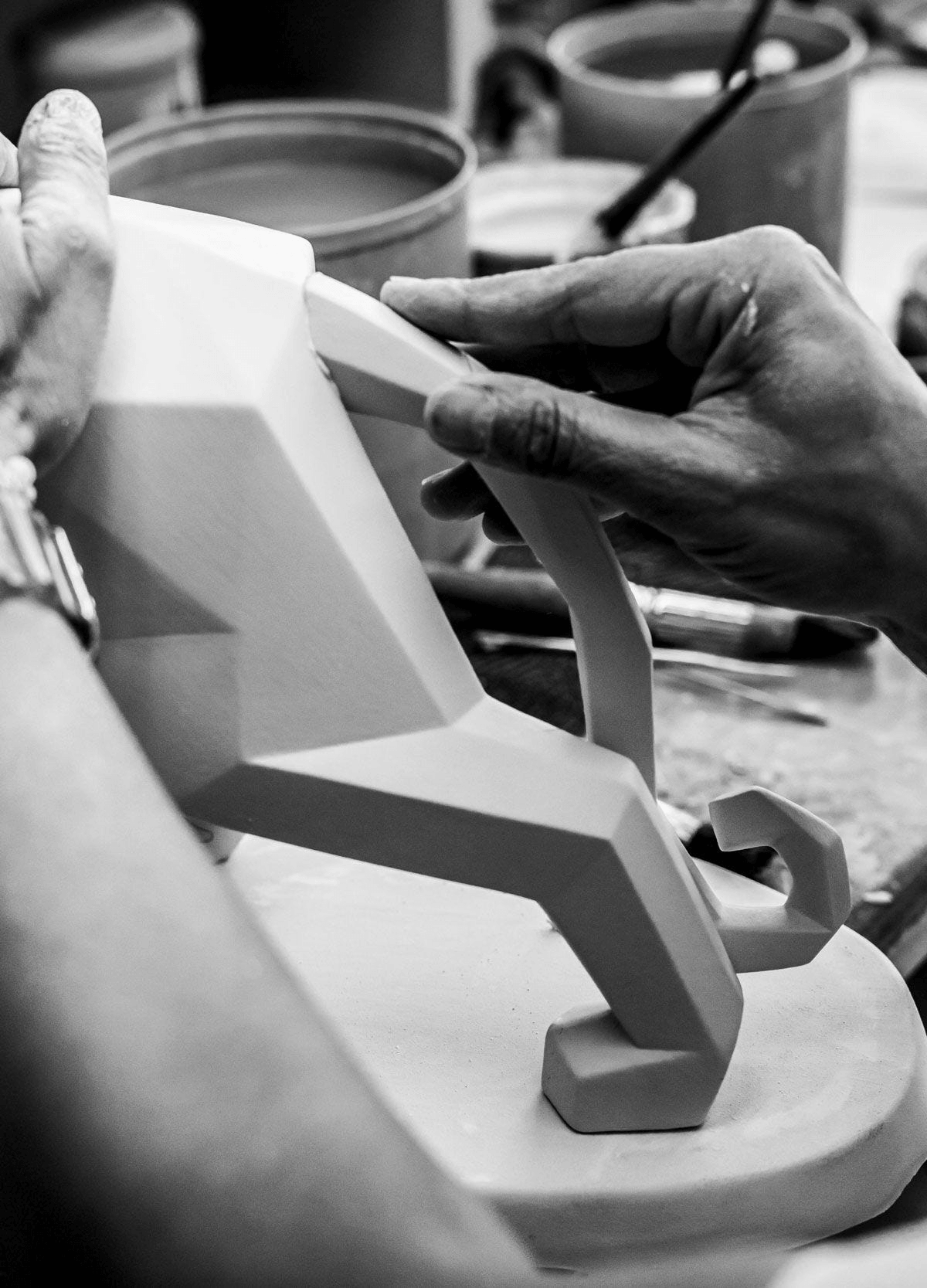 Lladró - Panther Sculpture - Blue Matte handcrafting process in porcelain, showcasing geometric details.