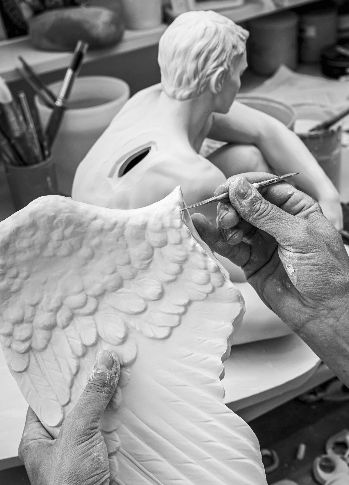Artisan crafting a Porcelain wing for Lladro: Lladró - Protective Angel Table Lamp.