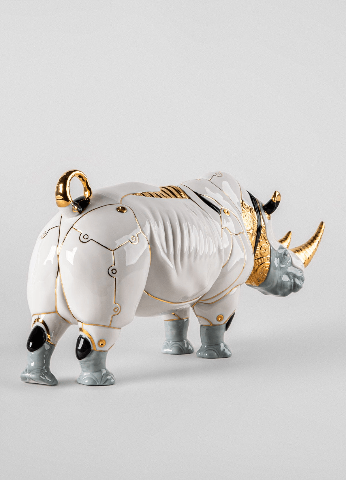 Lladró - Rhino Cyborg Sculpture featuring porcelain and intricate detailing of a cyborg rhino.