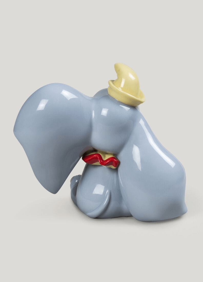 Lladró - Dumbo Figurine made of porcelain, featuring Dumbo with colorful accents from the Disney classic.