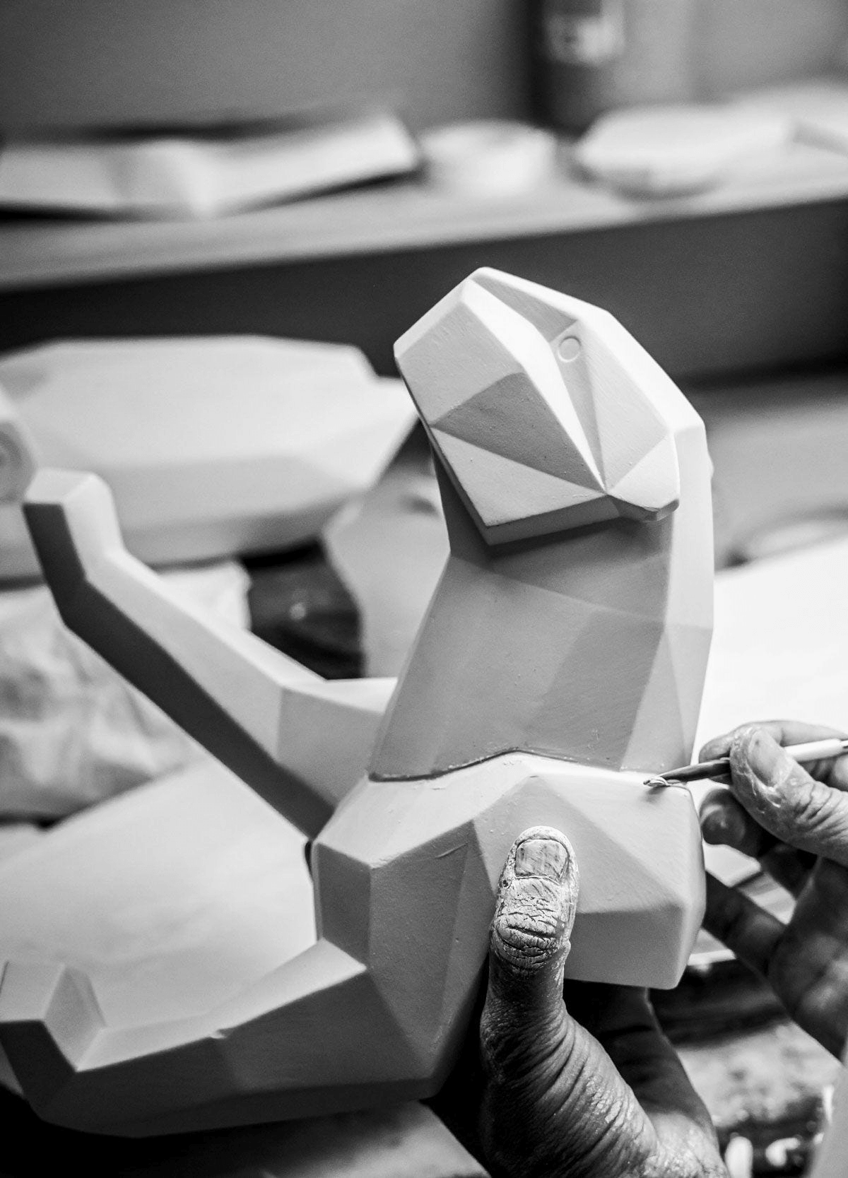 Lladró - Panther Sculpture - Iridiscent being crafted in porcelain with intricate geometric details.